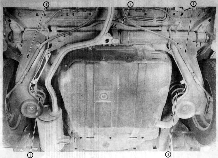 1.2b. Вид компонентов задней подвески из-под автомобиля (показана модель Precis). 1. Продольный…